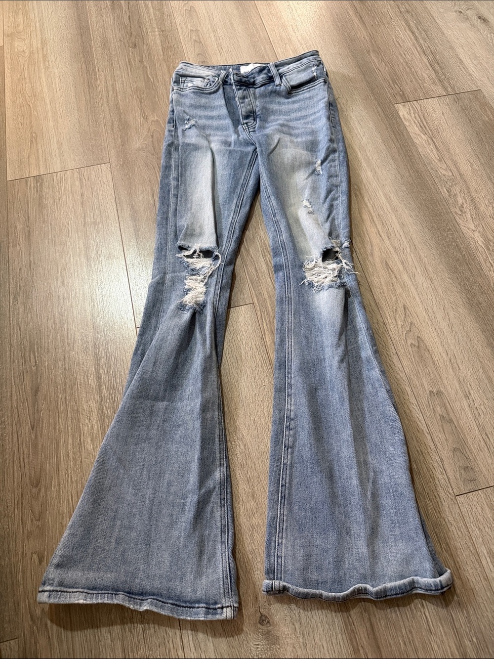 High-Rise Light Blue Distressed Flare Jeans - Women's